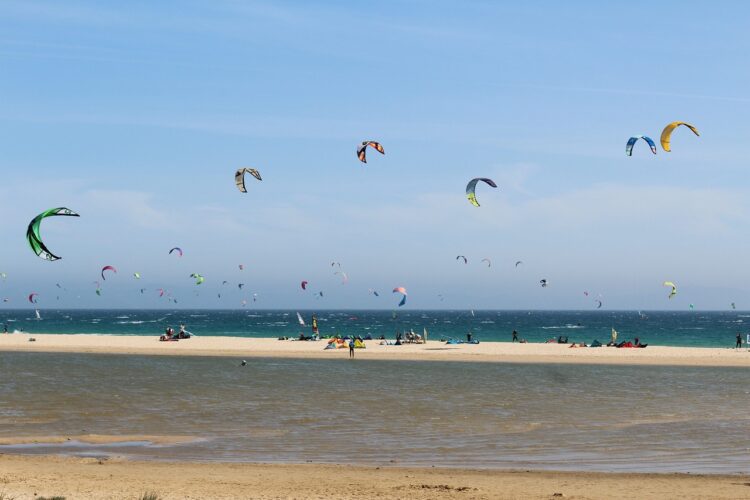 Coloirful kites on beac hin Tarifa